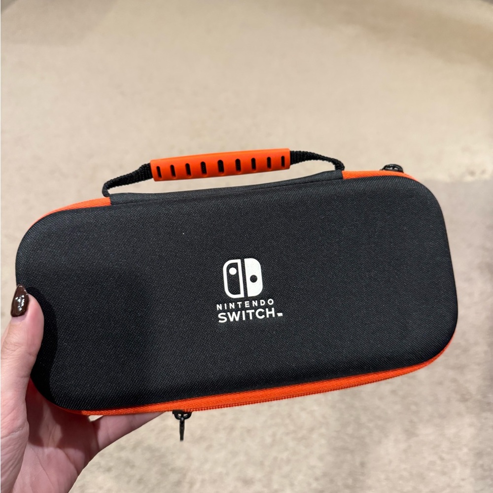 Nintendo Black and Orange Switch Case